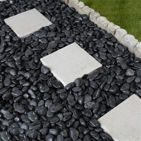 Super Black Polished Pebbles | Landscaping with rocks, Black rock landscaping, Decorative pebbles