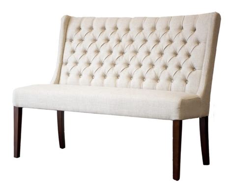 Cream Upholstered Bench With Tufted Back And Brown Wooden Tapered Legs As Well As Padded Dining ...