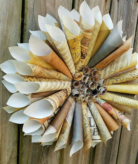 DIY Rolled Paper Wreath | SheSavvy | Rolled paper wreath, Paper wreath, How to make wreaths