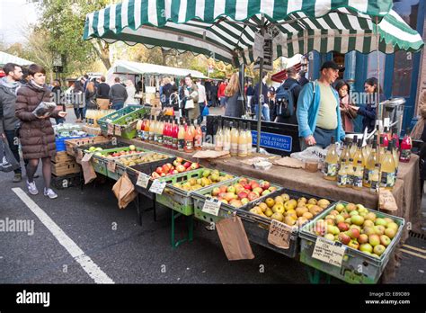 Fresh fruit and juice vendor in Broadway Market in Hackney, London Stock Photo, Royalty Free ...