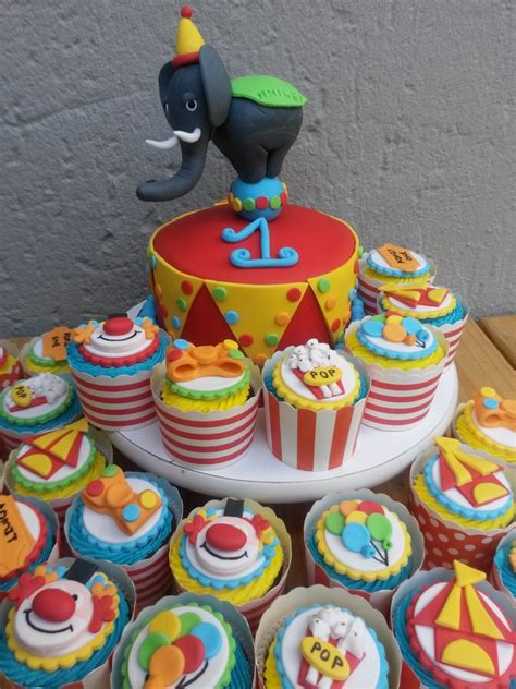 Carnival Themed Cake And Cupcakes - CakeCentral.com