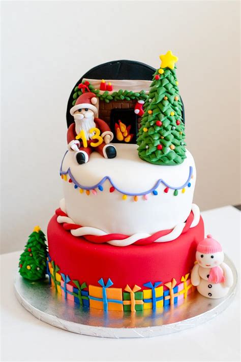 A Christmas themed birthday cake - Decorated Cake by - CakesDecor