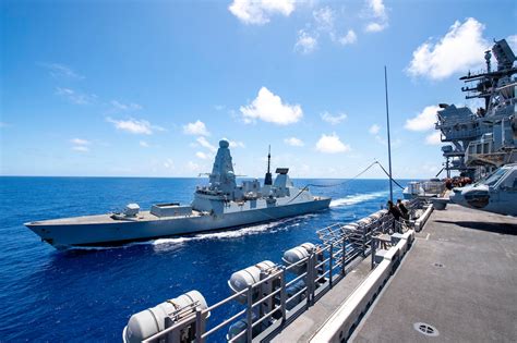 USS America fuels HMS Defender at sea in first FAS with U.S. amphib ...