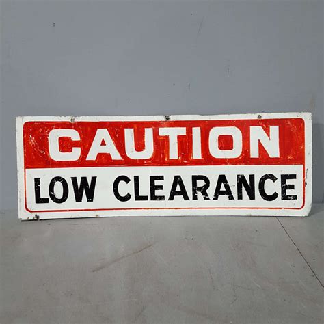 Caution Low Clearance Sign | Tramps Prop Hire