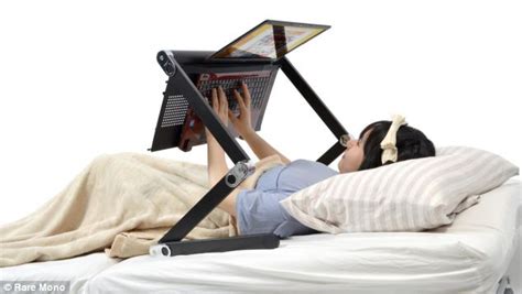 Japanese 'dozing desk' allows to to use your laptop while lying in bed | Daily Mail Online