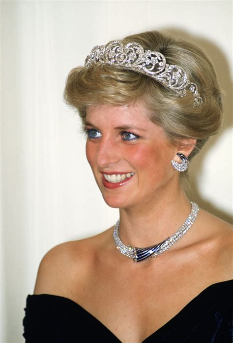 Diana, Princess of Wales wears a sapphire and diamond necklace, which ...