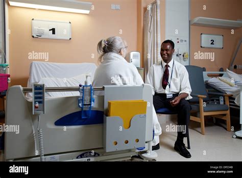 Chaplain with a hospital patient hi-res stock photography and images - Alamy