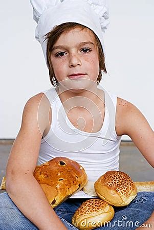 Young Baker Boy And Bread Royalty Free Stock Photo - Image: 8641945