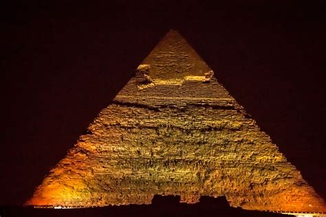 Pyramids at night - Pyramids of Giza in Egypt lit by spot lights in the ...