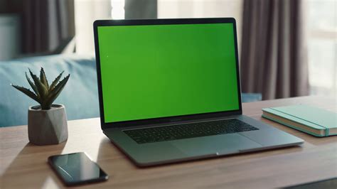 Laptop With Green Screen On Desk With Stock Footage SBV-338176044 - Storyblocks