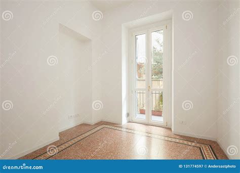 Empty, White Living Room with Large Window in a Renovated Apartment Stock Image - Image of ...