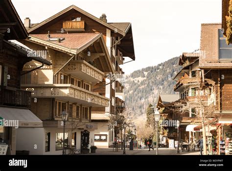 Walking through the Streets of Gstaad, Saanen in Switzerland Stock ...