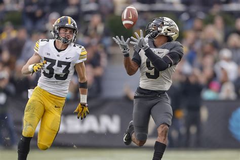 33 Days Until Iowa Football: Riley Moss - Black Heart Gold Pants