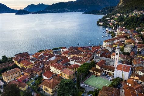 Italy, Province of Como, Menaggio, Helicopter view of town on shore of ...