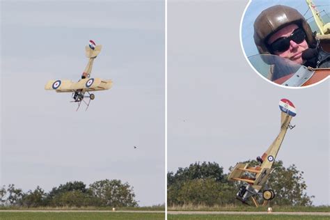 Heart-stopping moment WW1 replica biplane nosedives at ground before pilot pulled from wreck alive