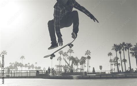 Skater boy practicing at the skate park Stock Photo | Adobe Stock