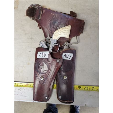 CAP GUNS W/ LEATHER HOLSTER - Schmalz Auctions