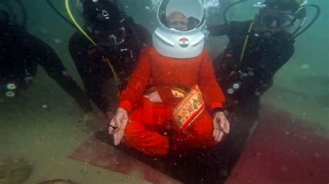 More than courage ...: Modi after diving down to pray in submerged ...