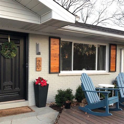 Grey paint exterior with cedar dark walnut stain shutters and black door. | Shutters exterior ...