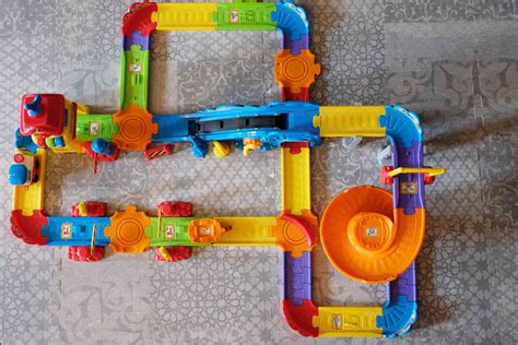 VTech Go! Go! Smart Wheels Train Station: Motorized Train Set