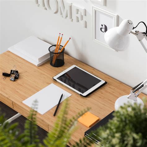 Free Photo | Neat and tidy workspace with tablet on desk