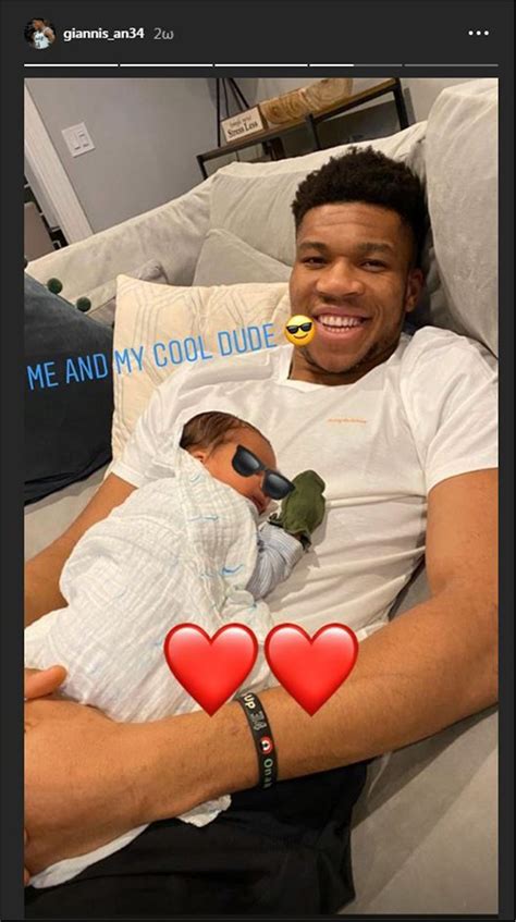 Giannis and Liam Charles: Antetokounmpo poses with son on his lap