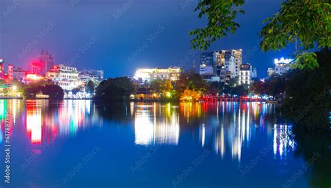 Hanoi City Old Quarters Lake at night glowing with vibrant colourful ...