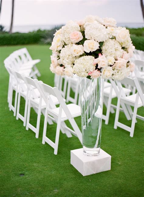 Ceremony Décor Photos - Floral Aisle Markers - Inside Weddings