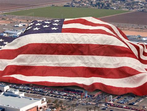 Giant American Flag Draped Over Entire Stadium During National Anthem