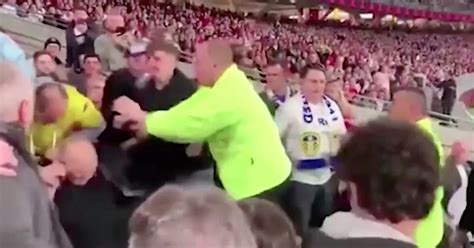 Man Utd and Leeds fans involved in mass brawl during pre-season ...