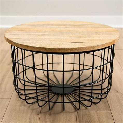 Mango Wood and Black Metal Basket Coffee Table from Kirkland's in 2021 | Coffee table, Round ...