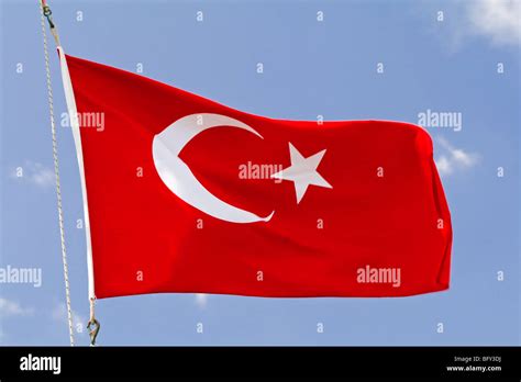 The flag of Turkey red with a white crescent moon and a star in its ...