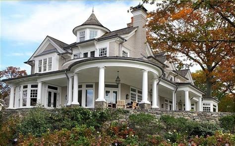 20 Homes With Beautiful Wrap-Around Porches - Housely | Traditional home exteriors, House ...