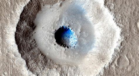 Bizarre Mars crater reveals huge slab of ice closer to surface than any ...