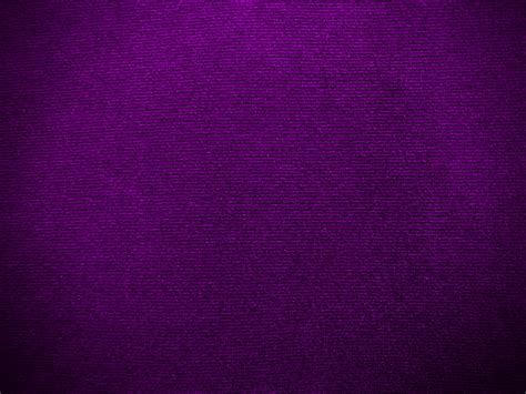 Dark purple velvet fabric texture used as background. Empty purple fabric background of soft and ...