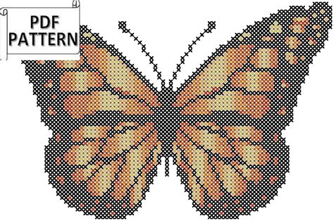 a cross stitch butterfly pattern in orange and black, with the words ...