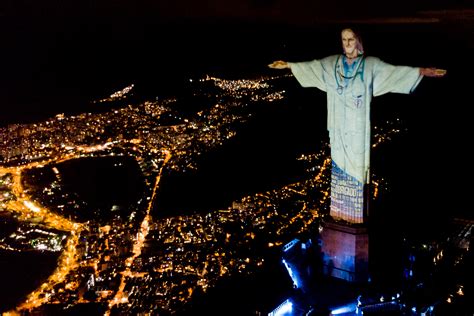 Rio's Christ the Redeemer statue lit up as a doctor, in tribute to healthcare workers fighting ...