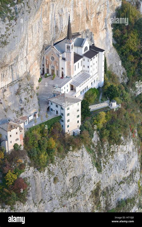 HOUSE OF WORSHIP ON A CLIFF FACE. Sanctuary of Madonna della Corona ...