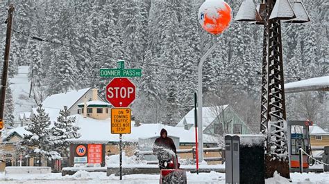 Blizzard slams California mountains, up to 12 feet of snow possible ...