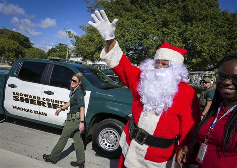 Pompano High, Broward Sheriff’s Office make giving toys a team effort