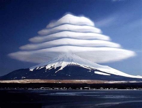 These are Lenticular Clouds. Lenticular clouds are stationary clouds ...