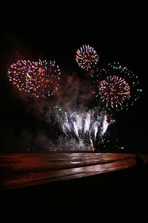 Fireworks from the beach stock photo. Image of bright - 6376424