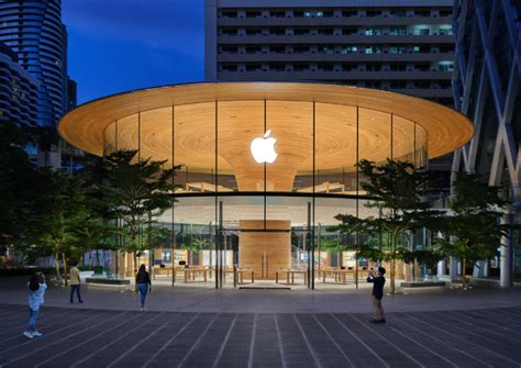 Bangkok's newest Apple Store is a 2-storey glass building with a gigantic tree canopy roof ...