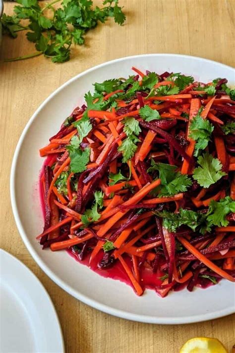 Beet and Carrot Slaw with Raisins and Nuts - walktoeat