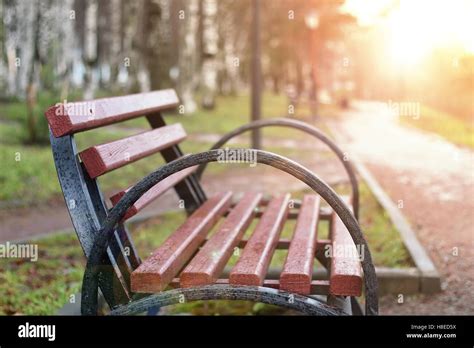 Sunset Park Bench Stock Photo - Alamy