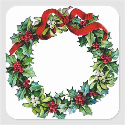 a christmas wreath with holly and red ribbon