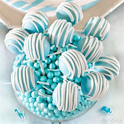 Baby blue cake pops with stripey white drizzles - perfect for a blue ...