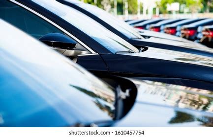 Group Black Cars Parked Row Stock Photo 1610457754 | Shutterstock