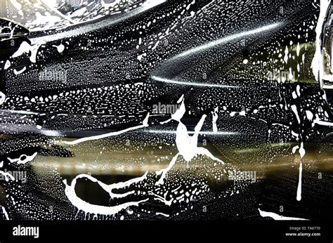 Car wash black with foam bubbles Stock Photo - Alamy