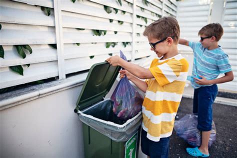 210+ Child Taking Out Trash Photos Stock Photos, Pictures & Royalty-Free Images - iStock